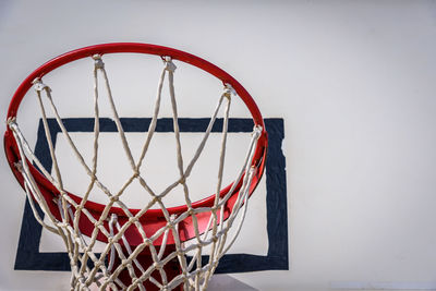 Close-up of basketball hoop against sky