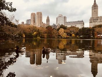 Reflection of buildings in lake