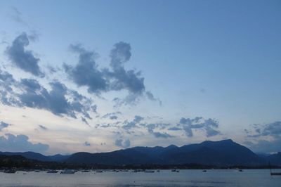 Scenic view of lake against blue sky