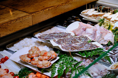 High angle view of fish in plate on table