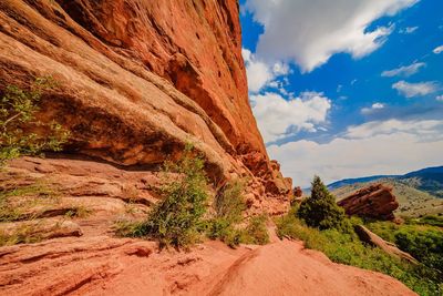 Scenic view of mountain against cloudy sky