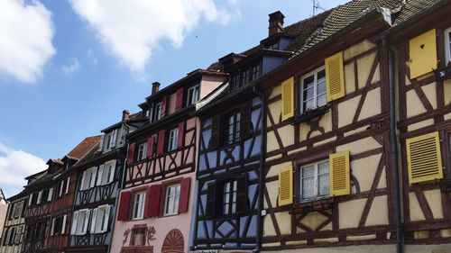 Low angle view of houses against sky