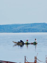 People kayaking in lake