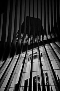 Low angle view of modern building in city at night