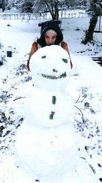 Portrait of happy girl in snow