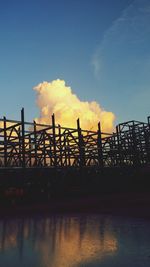 Built structure against sky at sunset