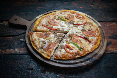 High angle view of pizza on table