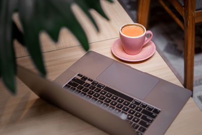 Close-up of laptop on table