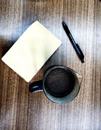 High angle view of coffee cup on table