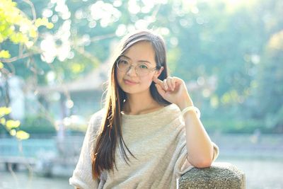 Portrait of smiling young woman