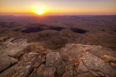 Aerial view of desert during sunset