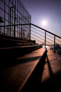 View of bridge in city at sunset