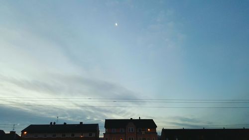 Low angle view of moon against sky