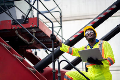 Portrait of man working at construction site