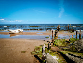 Scenic view of beach against sky