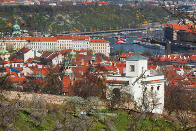 High angle view of houses and trees in town