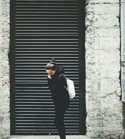 Full length of boy standing outdoors