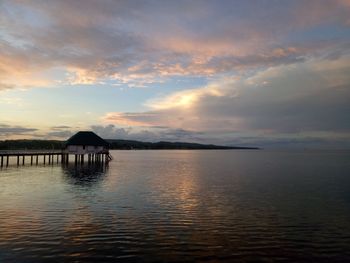 Scenic view of sea against sky at sunset