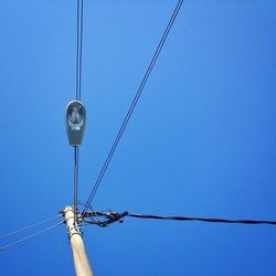 Low angle view of electricity pylon