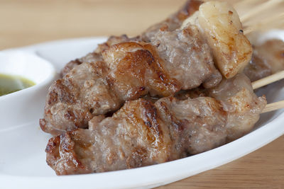 High angle view of meat in plate on table