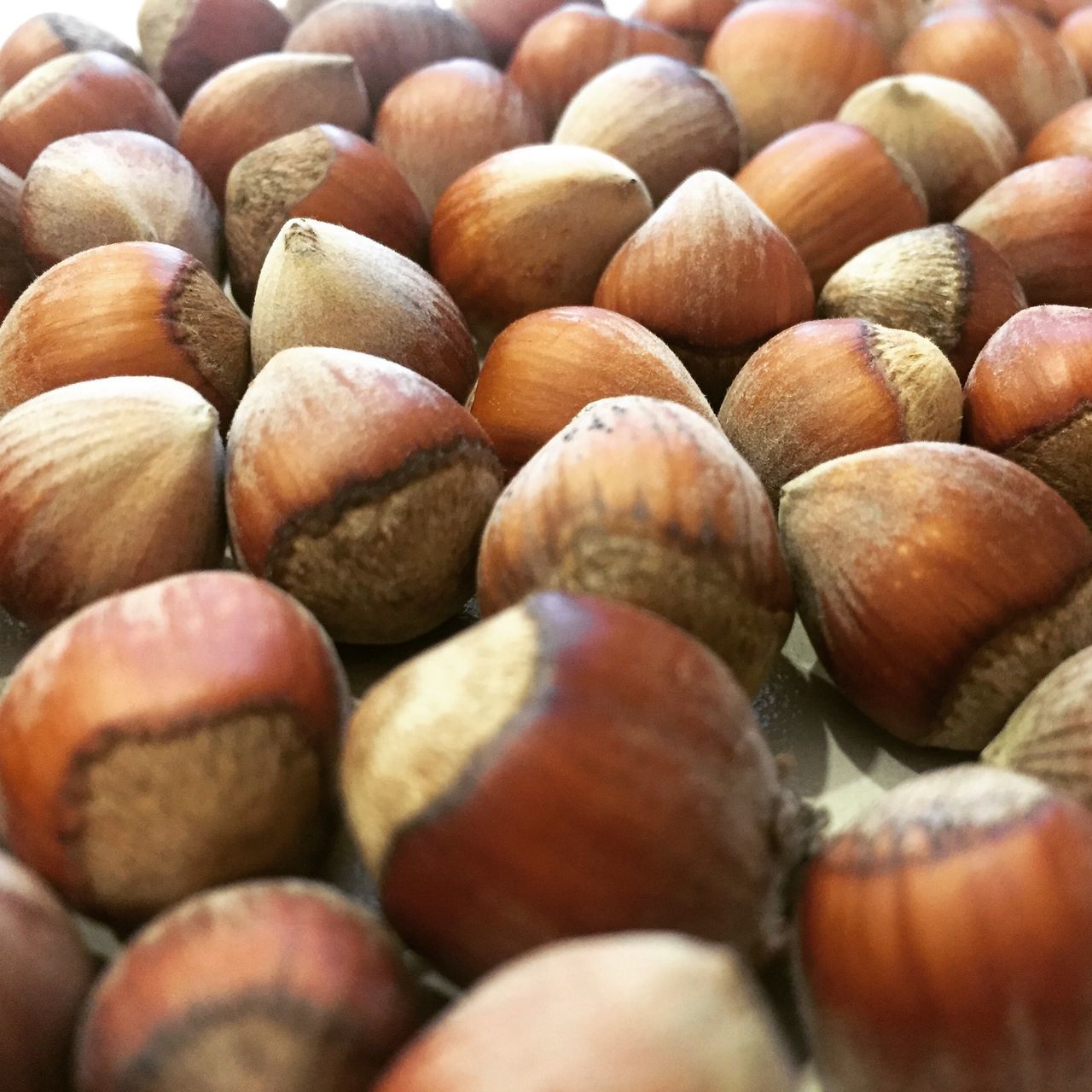 abundance, large group of objects, full frame, food and drink, backgrounds, food, healthy eating, freshness, close-up, still life, heap, stack, indoors, variation, pebble, selective focus, brown, no people, nut - food, market