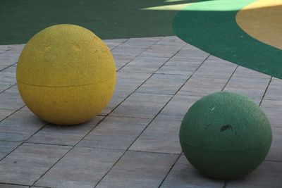 Close-up of yellow balls on table