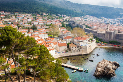Dubrovnik west pier and medieval fortifications of the city seen from fort lovrijenac
