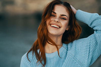 Portrait of smiling young woman