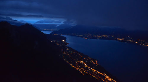 Aerial view of illuminated city at night