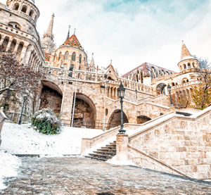 Fisherman's bastion in early winter morning, snow-covered streets of budapest