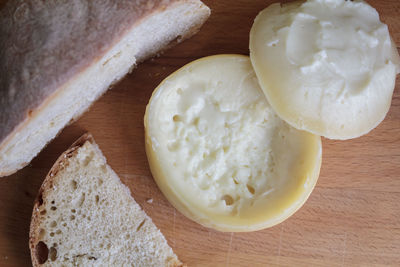 Top view of azeitao cheese, a creamy and semi soft portuguese cheese with bread