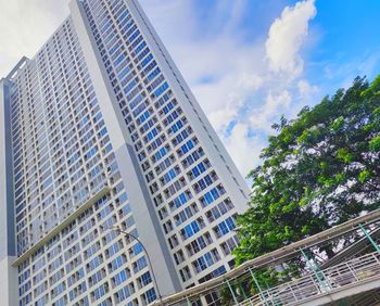 Low angle view of modern building against sky