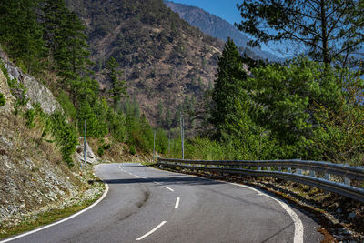 Mountain curvy tarmac road empty isolated at morning form flat angle