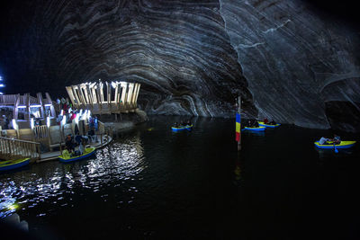 View of people in water at night