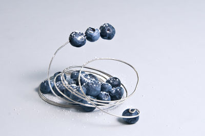High angle view of water drops on white background