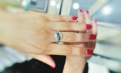 Close-up of woman hand showing ring worn in finger