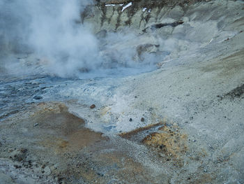 Smoke emitting from volcanic landscape