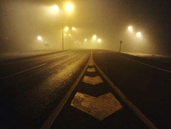 Illuminated road at night