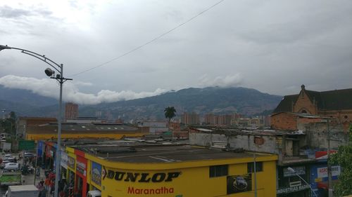 Aerial view of city against sky