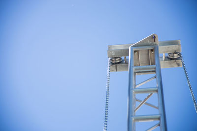 Low angle view of built structure against blue sky