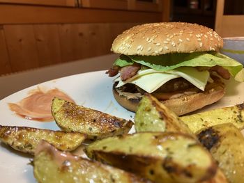 Close-up of burger in plate on table