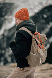 Rear view of man standing outdoors