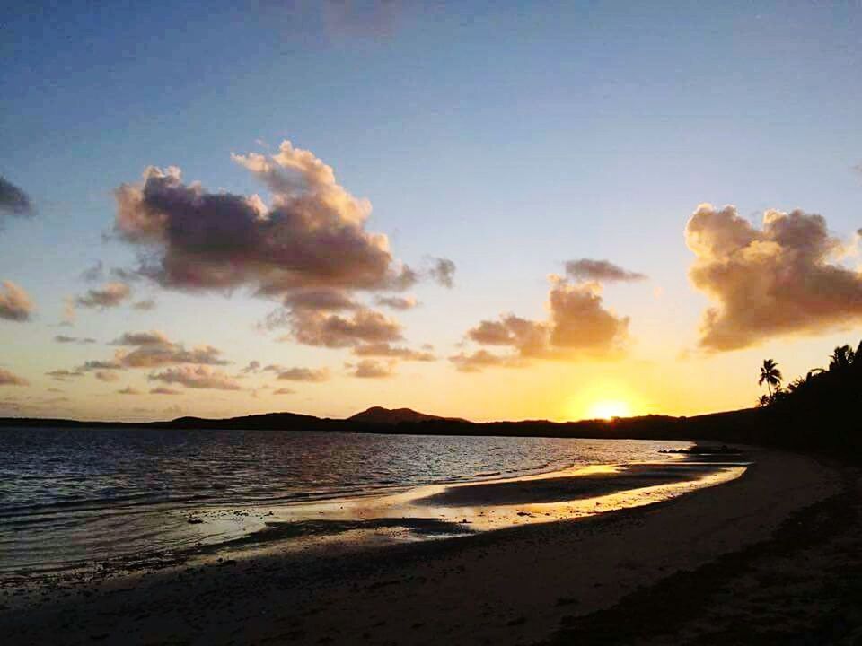 sunset, beach, water, tranquil scene, scenics, sea, tranquility, beauty in nature, sky, shore, sand, nature, idyllic, cloud - sky, orange color, coastline, sun, horizon over water, reflection, cloud