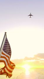 Low angle view of airplane flying in sky