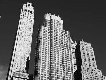 Low angle view of modern buildings against clear sky