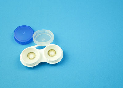 High angle view of blue eggs on white background