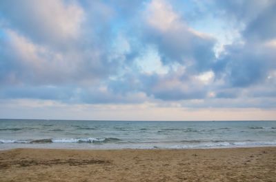 Scenic view of beach against sky