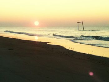 Scenic view of sea at sunset