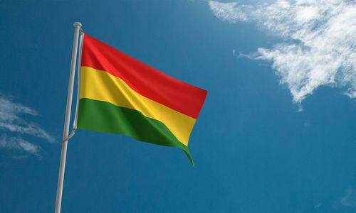 Low angle view of flag against sky