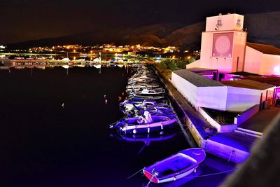 Aerial view of illuminated city at night